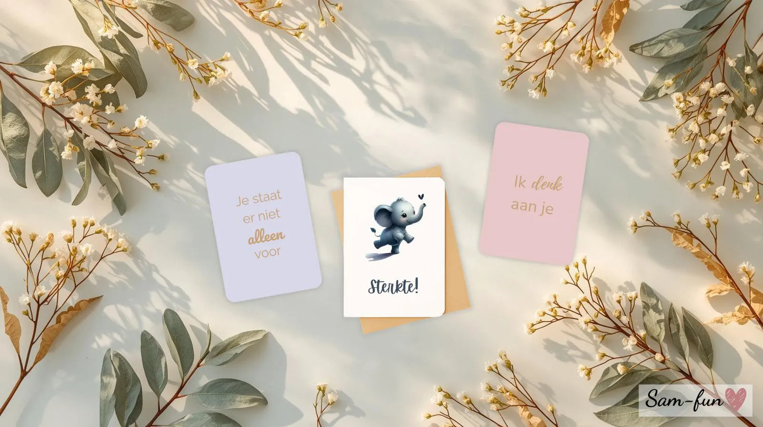 Sterktekaart met groene bladeren en handgeschreven bemoedigende boodschap op lichte achtergrond