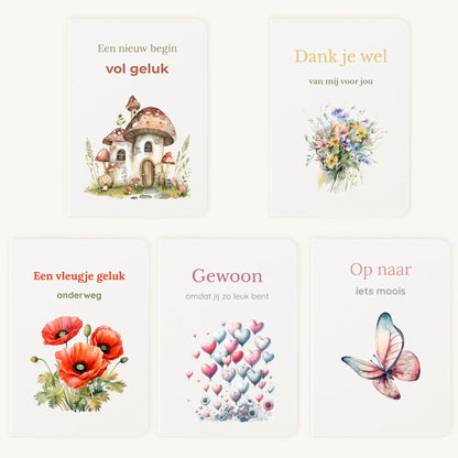 Aquarel kaartenset met andere 5 handgeschilderde wenskaarten uitgespreid