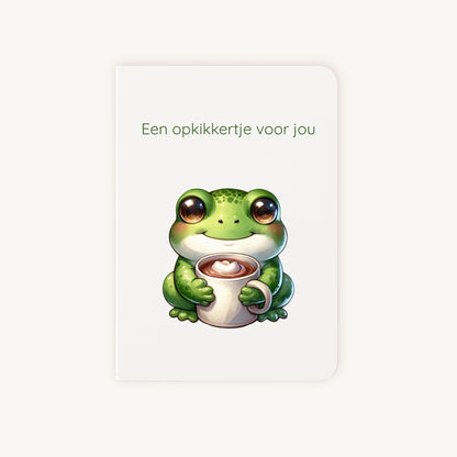 Beterschapskaart met groene kikker en chocolademelk