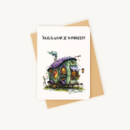 Staande kaart met huisje op wielen op kraftenvelop.