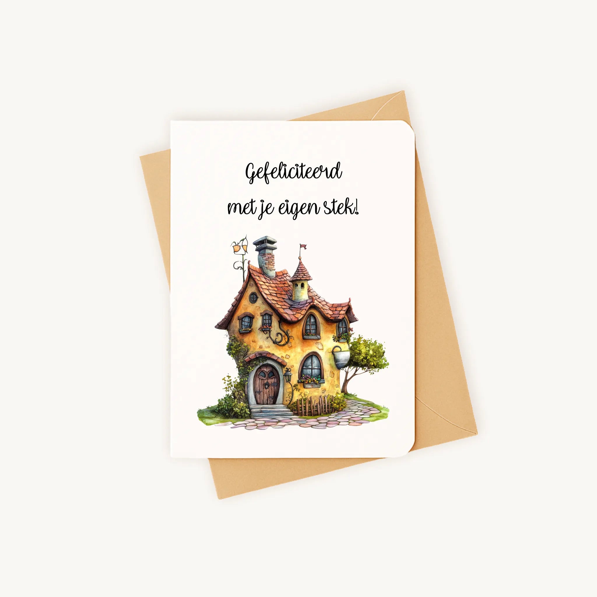 Staande kaart nieuwe woning met sprookjeshuisje op kraftenvelop.