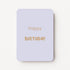 Staande pastelblauwe minikaart met goudbeige tekst "Happy BIRTHDAY".