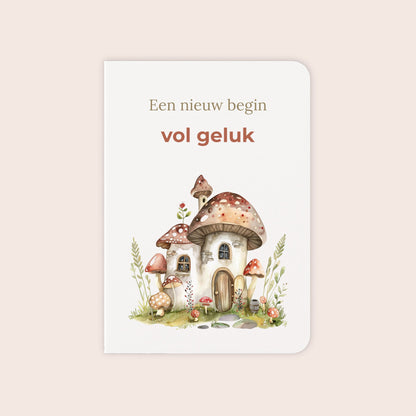 Felicitatiekaart voor een nieuwe woning met paddenstoelenhuis
