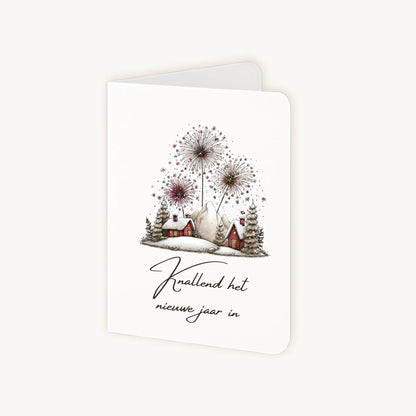 Staande nieuwjaarskaart half geopend met sneeuwlandschap en kleurrijk vuurwerk.