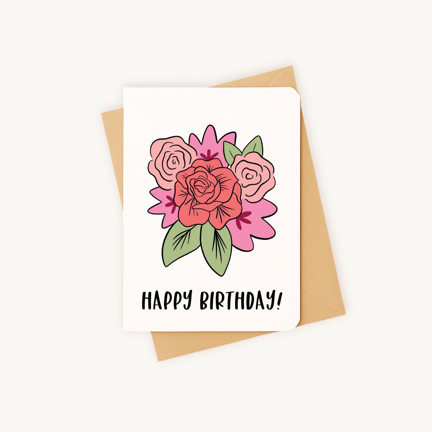 Verjaardagskaart bloemen liggend naast natuurlijke kraft envelop A6 formaat